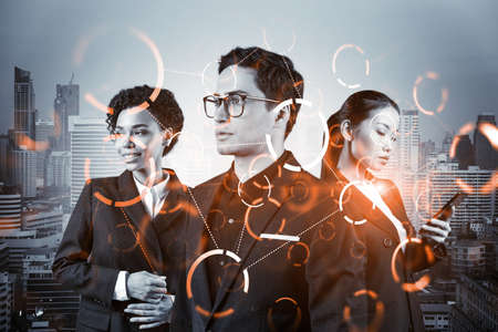 Group of business colleagues working on technology at business process to achieve tremendous growth in commerce. Worldwide process to conduct transactions.の写真素材