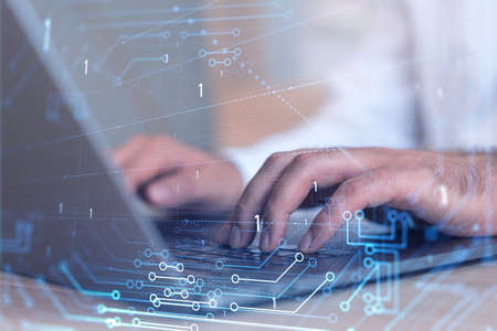 Hands typing the keyboard to create innovative software to change the world and provide a completely...