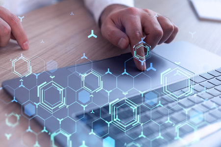 Hands typing the keyboard to create innovative software to change the world and provide a completely new service. Close up shot. Hologram tech graphs. Concept of Dev team. Formal wear.の写真素材