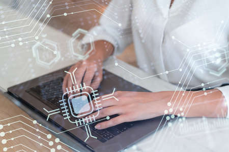 Woman typing the keyboard to create innovative software to change the world and provide a completely...
