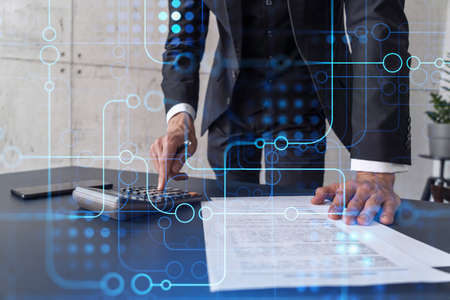 A research and development specialist computing the data to create a new approach to develop high...
