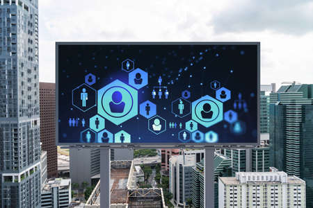 Glowing Social media icons on road billboard over panoramic city view of Singapore, Southeast Asia....