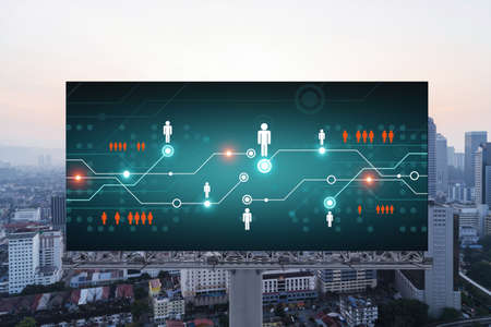 Glowing Social media icons on billboard over sunset panoramic city view of Kuala Lumpur, Malaysia,...
