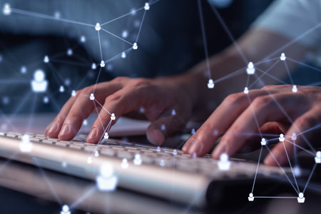 Hands of hr specialist is typing the keyboard in the internet to find the best candidates to create...