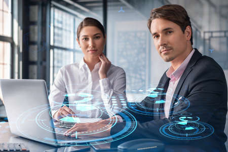 Businessman and businesswoman in formal wear working together to optimize business process by...