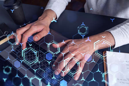 Hands typing the keyboard to create innovative software to change the world and provide a completely...
