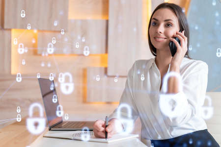 Attractive businesswoman in white shirt has conference call of cyber security in compliance division...