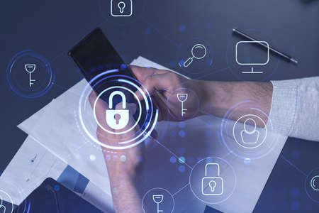 A programmer is browsing the Internet in smart phone to protect a cyber security from hacker attacks...