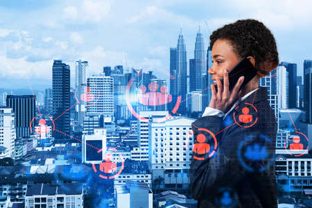Attractive black woman new approaches to protect clients confidential information using phone. IT...
