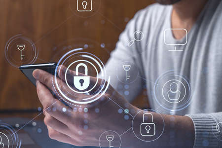A programmer is browsing the Internet in smart phone to protect a cyber security from hacker attacks...