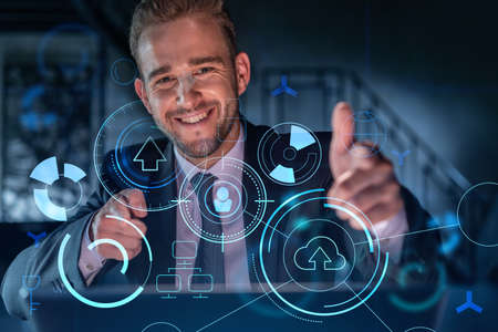 Portrait of handsome businessman in formal suit thinking how to optimize business process by...