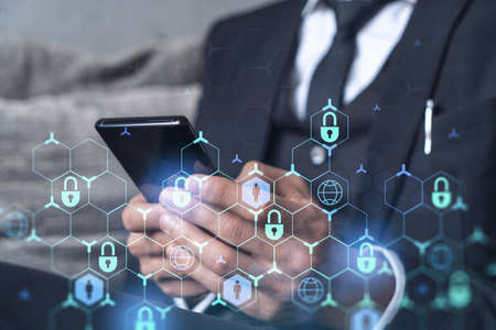 A programmer is browsing the Internet in smart phone to protect a cyber security from hacker attacks...