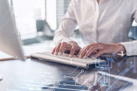 Woman typing the keyboard to create innovative software to change the world and provide a completely...