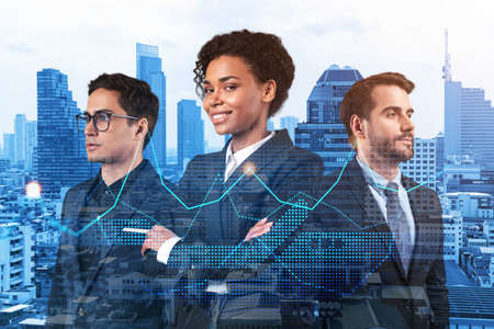 Group of business colleagues in suits as a part of multinational corporate team working on forecasting trading corporate strategy at fund. Forex chart. Bangkok on background. Double exposureの写真素材