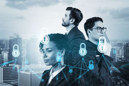 Group of business colleagues as a part of multinational corporate team working on project to protect clients information at cybersecurity compliance division. IT lock icons over Singaporeの写真素材
