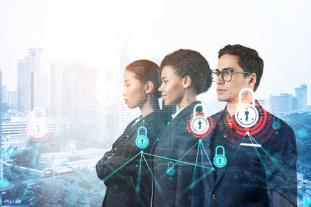 Group of business colleagues as a part of multinational corporate team working on project to protect clients information at cybersecurity compliance division. IT lock icons over Kuala Lumpurの写真素材