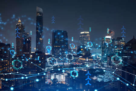 Information flow hologram, night panorama city view of Bangkok. The largest technological center in...