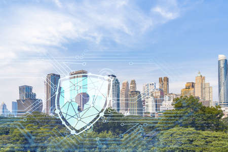 Padlock icon hologram over panorama city view of Bangkok to protect business in Southeast Asia. The concept of information security shields. Double exposure.の写真素材