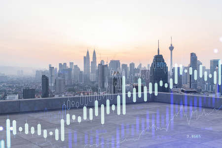 Rooftop with concrete terrace, Kuala Lumpur sunset skyline. Forecasting and business modeling of financial markets hologram digital charts. City downtown. Double exposure.の写真素材