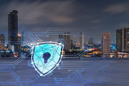 Rooftop with concrete terrace, Bangkok night skyline. Cyber security concept to protect clients...