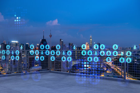 Rooftop with concrete terrace, Kuala Lumpur night skyline. Recruitment process to hire candidates for international business consulting. HR, networking digital icons. City downtown. Double exposure.の写真素材