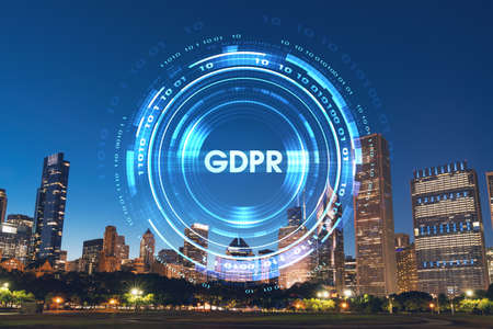 Chicago skyline from Butler Field to financial district skyscrapers, night time, Illinois, USA. Parks and gardens. GDPR hologram, concept of data protection regulation and privacy for individualsの写真素材