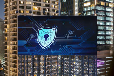 Padlock icon hologram on road billboard over panorama city view of Bangkok at night to protect business, Southeast Asia. The concept of information security shields.の写真素材