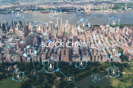 Aerial panoramic helicopter city view, Upper West Side of Manhattan and Central Park, New York, USA. decentralized economy. Blockchain, cryptography and cryptocurrency concept, hologramの写真素材