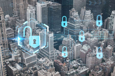 Aerial birds eye panoramic city view of Upper Manhattan area and East Side neighborhoods, New York city, USA. The concept of cyber security to protect confidential information, padlock hologramの写真素材