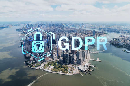 Aerial panoramic helicopter city view on Lower Manhattan district and financial Downtown, New York, USA. GDPR hologram, concept of data protection regulation and privacy for all individualsの写真素材