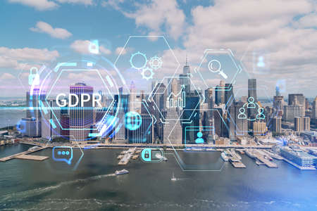 Aerial panoramic helicopter city view on Lower Manhattan district and financial Downtown, New York, USA. GDPR hologram, concept of data protection regulation and privacy for all individualsの写真素材