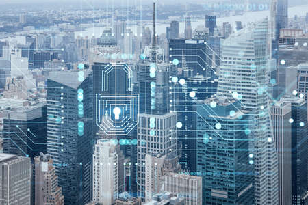Aerial panoramic city view of Time Square area, Manhattan West Side and the Hudson River, New York city, USA. The concept of cyber security to protect confidential information, padlock hologramの写真素材