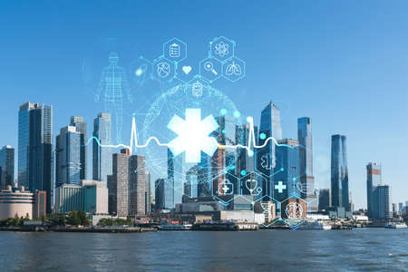 New York City skyline from New Jersey over the Hudson River towards the Hudson Yards at day. Manhattan, Midtown. Health care digital medicine hologram. The concept of treatment and disease preventionの写真素材