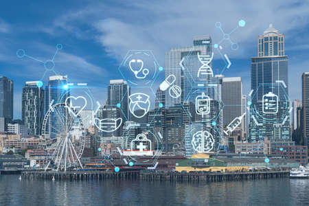 Seattle skyline with waterfront view. Skyscrapers of financial downtown at day time, Washington, USA. Health care digital medicine hologram. The concept of treatment and disease preventionの写真素材
