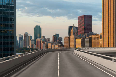 Empty urban asphalt road exterior with city buildings background. New modern highway concrete construction. Concept of way to success. Transportation logistics industry fast delivery. Chicago. USA.の写真素材