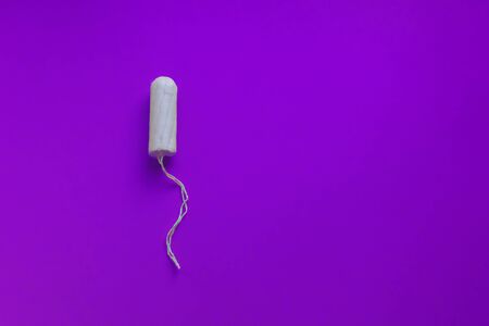 Feminine tampons and menstrual hygiene on purpleの写真素材
