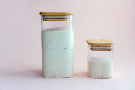wheat sourdough in jars. Place for text.の写真素材