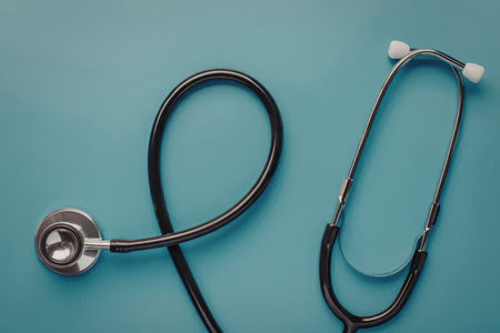 Stethoscope, a classic medical instrument for listening to internal body sounds, is presented neatly...