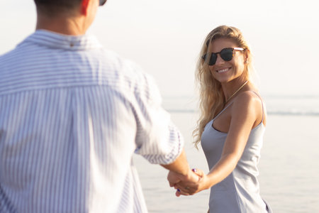 Portrait of amused friends in sunglasses. Stylish male and female models looking at camera. Style, friendship conceptの写真素材