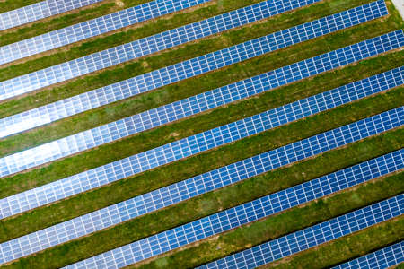 solar panes in a solar park used for clean energy production. aerial view. Drone photo