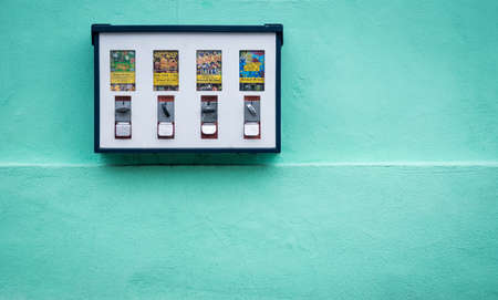 DÃ¼rrn, Germany - November 3, 2019: close-up of a chewing gum sweets spender machine on an outside...