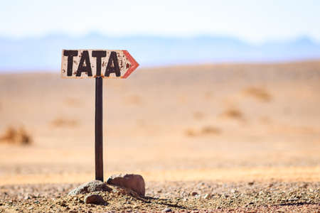 Tata, Morocco - January 2, 2017: directional road sign to TATA in the middle of the Sahara desert