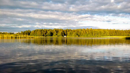 Fishermen's lodge on lake at sunset, Swedenの写真素材