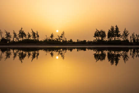 National Park La Langue de Barbarie Senegal Calm Lagoon Sunset Reflection Atlantic ocean Senegalの写真素材