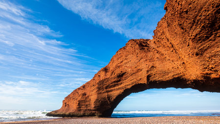 Natural phenomenon stone arch bridge of Legzira Beach, Atlantic ocean, Moroccoの写真素材
