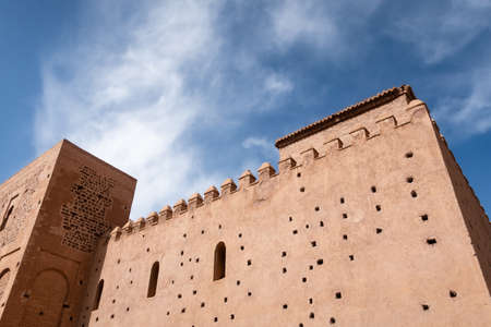 Tinmel, Morocco - low angle view of architectural arches and columns of abandoned ancient mosque ruin against blue skyの写真素材