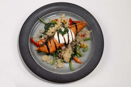grilled salmon steak with rice and vegetablesの写真素材