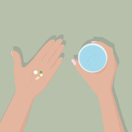 Taking medications vector flat illustration. Hands holding a glass of water and medicine pills and vitaminsのイラスト素材