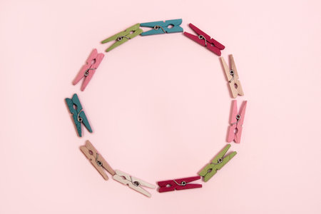 Colorful clothespin circle flat lay