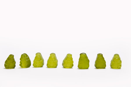 Green hippo gummy candy isolated on whiteの写真素材